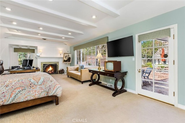 bedroom with beamed ceiling, light colored carpet, and access to exterior