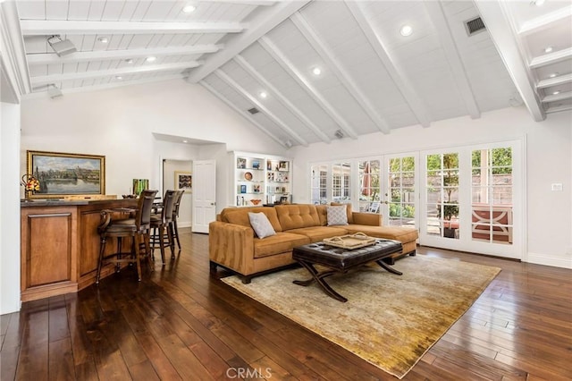 living room featuring beamed ceiling, dark wood-type flooring, high vaulted ceiling, and french doors