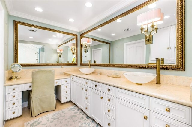 bathroom featuring vanity, tile patterned flooring, and crown molding