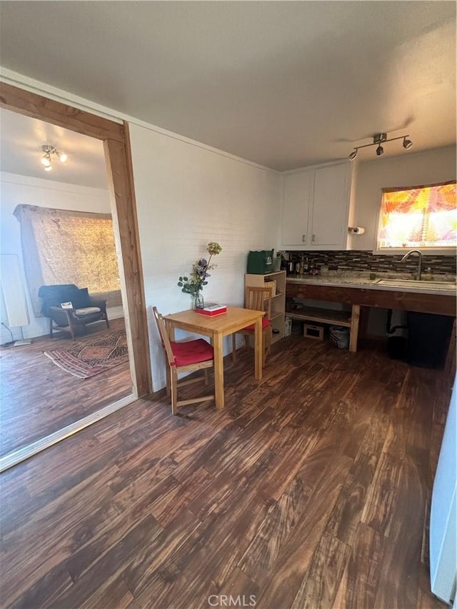 dining room with dark wood finished floors