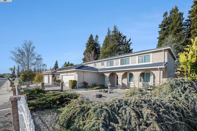 view of front of home with a garage