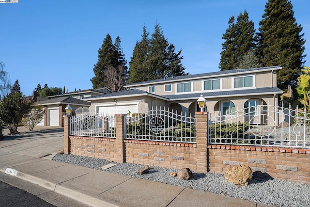 view of front of property with a garage