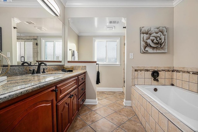 bathroom with vanity, a healthy amount of sunlight, tile patterned floors, and ornamental molding