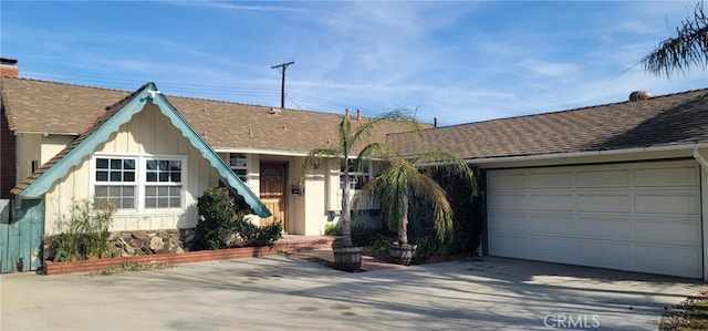 ranch-style house featuring a garage