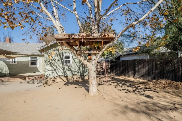 rear view of property featuring a patio