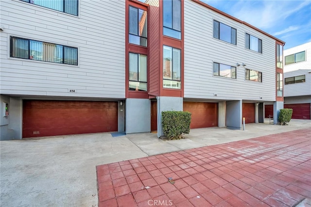 view of property exterior featuring a garage