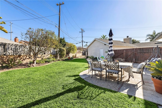 view of yard with a patio area