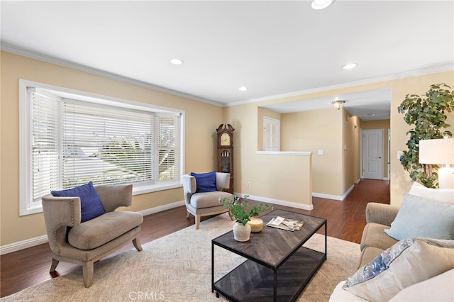 living room featuring wood-type flooring and ornamental molding