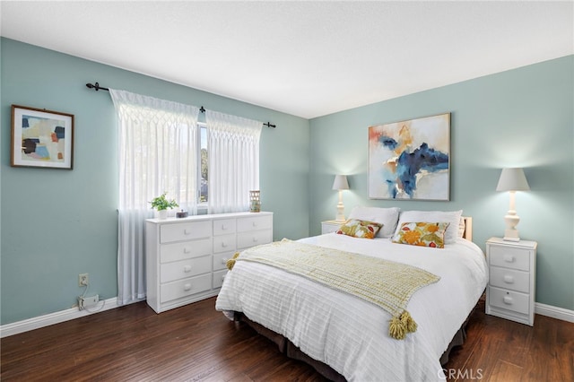 bedroom featuring dark wood-type flooring