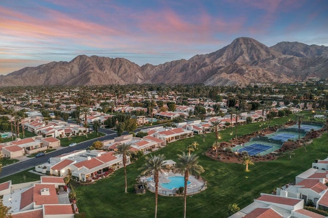 aerial view at dusk with a mountain view