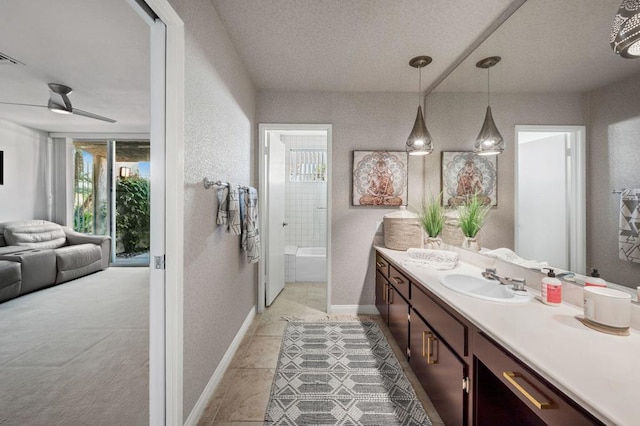 bathroom with vanity, tile patterned flooring, and ceiling fan