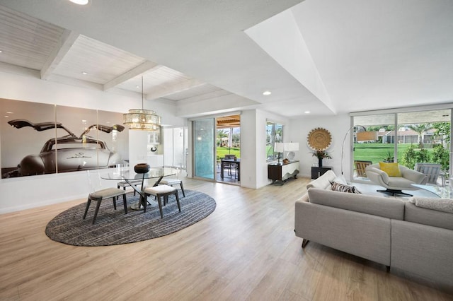 dining area with beamed ceiling, a chandelier, light hardwood / wood-style floors, and wooden ceiling