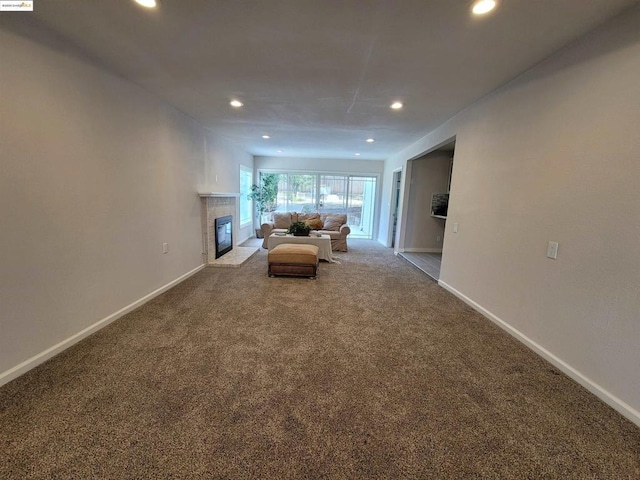 unfurnished living room with carpet floors