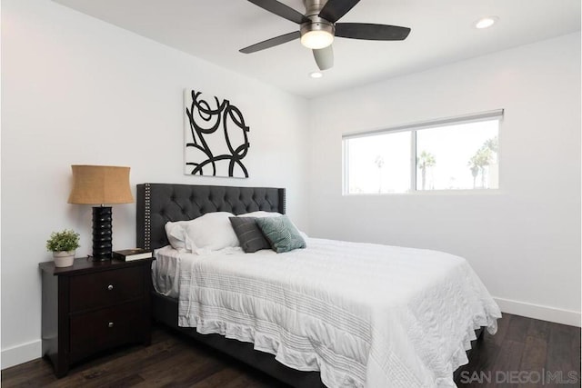 bedroom featuring dark wood-type flooring and ceiling fan