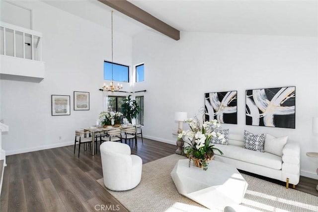 living room featuring dark hardwood / wood-style flooring, beamed ceiling, high vaulted ceiling, and a chandelier