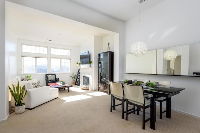 dining area with carpet flooring