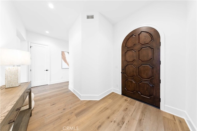 entryway with light hardwood / wood-style flooring