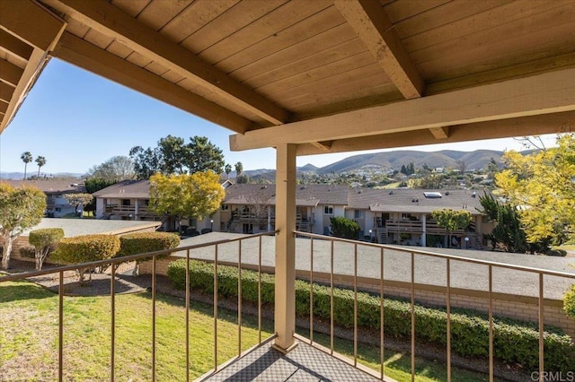 balcony featuring a mountain view