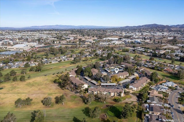 birds eye view of property featuring a mountain view