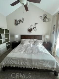 bedroom with ceiling fan and vaulted ceiling