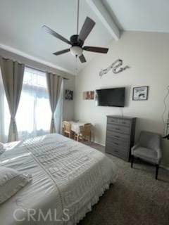 bedroom featuring ceiling fan and vaulted ceiling with beams