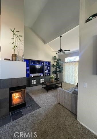 living room featuring ceiling fan, high vaulted ceiling, and dark colored carpet