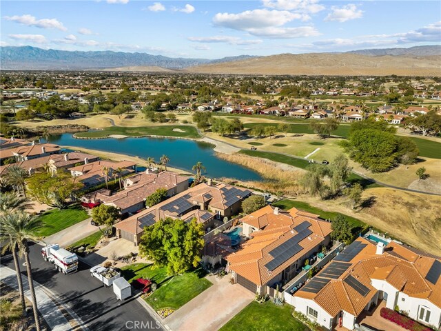 aerial view featuring a residential view and a water and mountain view