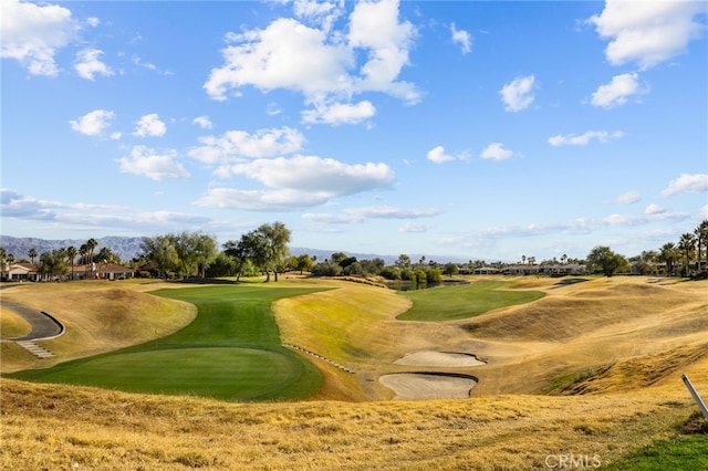 view of property's community with view of golf course