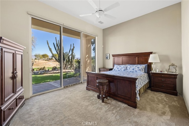 bedroom with a ceiling fan, access to outside, light carpet, and visible vents