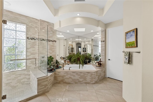 bathroom with tile patterned flooring, a shower stall, visible vents, and a bath