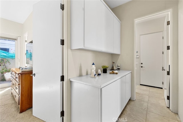 interior space featuring light tile patterned flooring