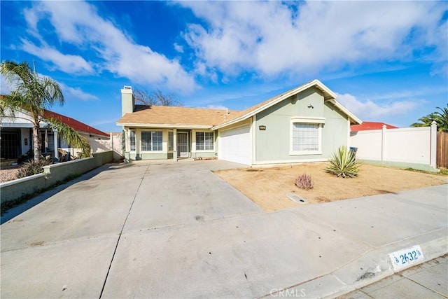 single story home featuring a garage