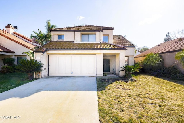 mediterranean / spanish-style house with a garage and a front lawn