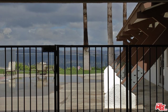 view of gate featuring a water view