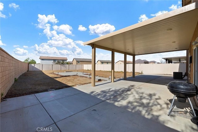 view of patio with a grill and cooling unit