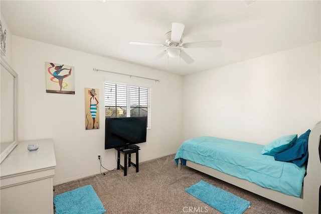 bedroom featuring ceiling fan and light colored carpet