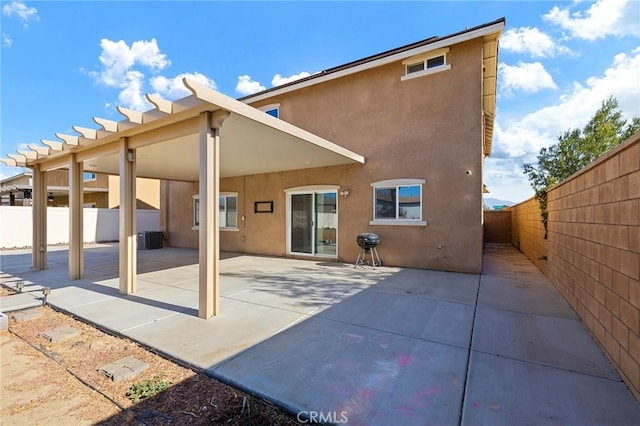 rear view of property with a patio area