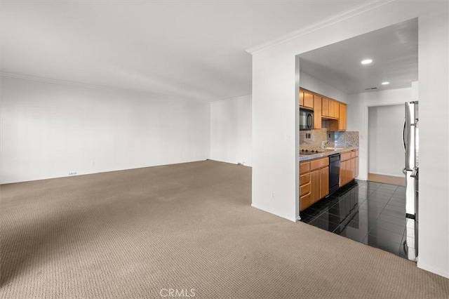 kitchen with tasteful backsplash, dark carpet, and black appliances