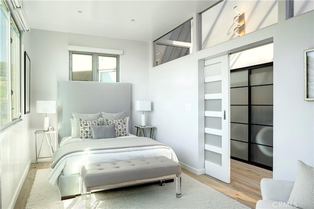 bedroom featuring light hardwood / wood-style flooring