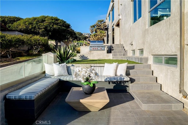 view of patio featuring area for grilling and outdoor lounge area