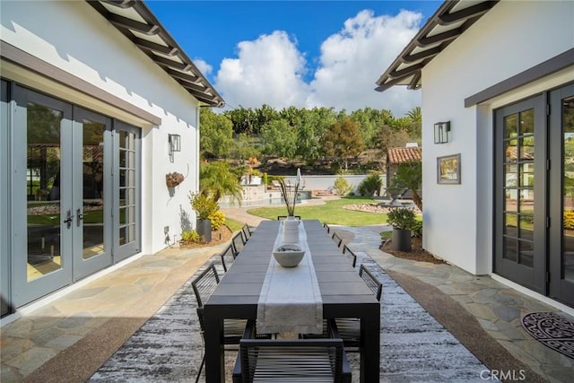 view of patio featuring french doors