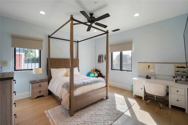 bedroom featuring ceiling fan and light wood-type flooring