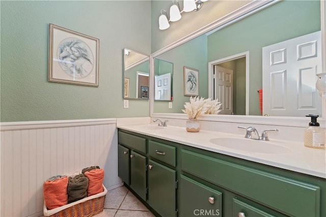 bathroom with vanity and tile patterned floors