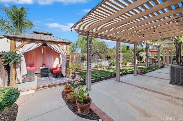 view of patio with central AC unit, an outdoor hangout area, and a pergola