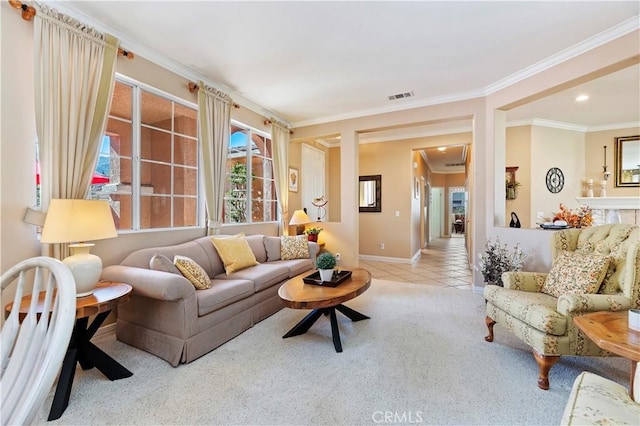 living room with light tile patterned floors and crown molding