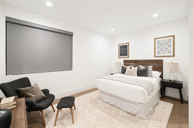 bedroom featuring wood-type flooring