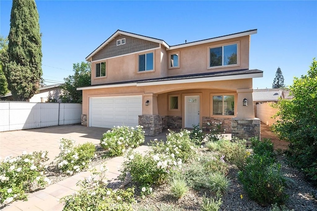 view of front of property featuring a garage