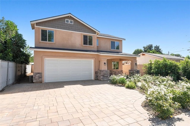 view of front of home with a garage