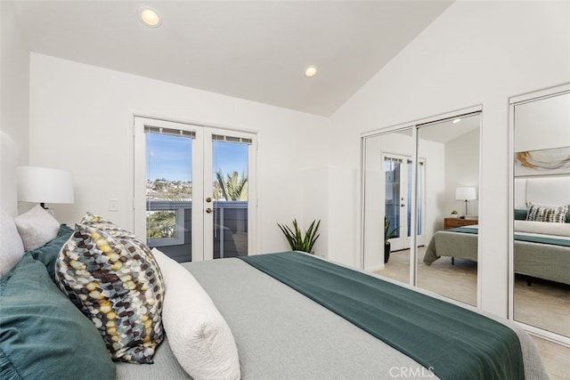 bedroom with french doors, lofted ceiling, and access to exterior