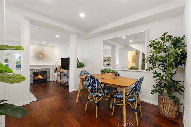 dining area with dark hardwood / wood-style floors